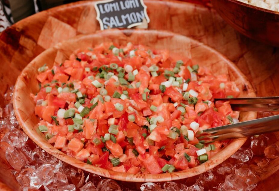 Authentic Hawaiian poke, otherwise known as Lomi Lomi Salmon, pairs beautifully with our authentic Hawaiian dishes.. It's served with fish, green onions, white onions, green onions and a homemade secret poke sauce